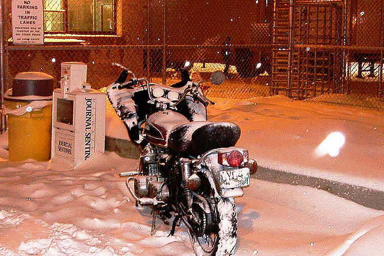 Curious Sight, who rides in the middle of a winter snow storm?
